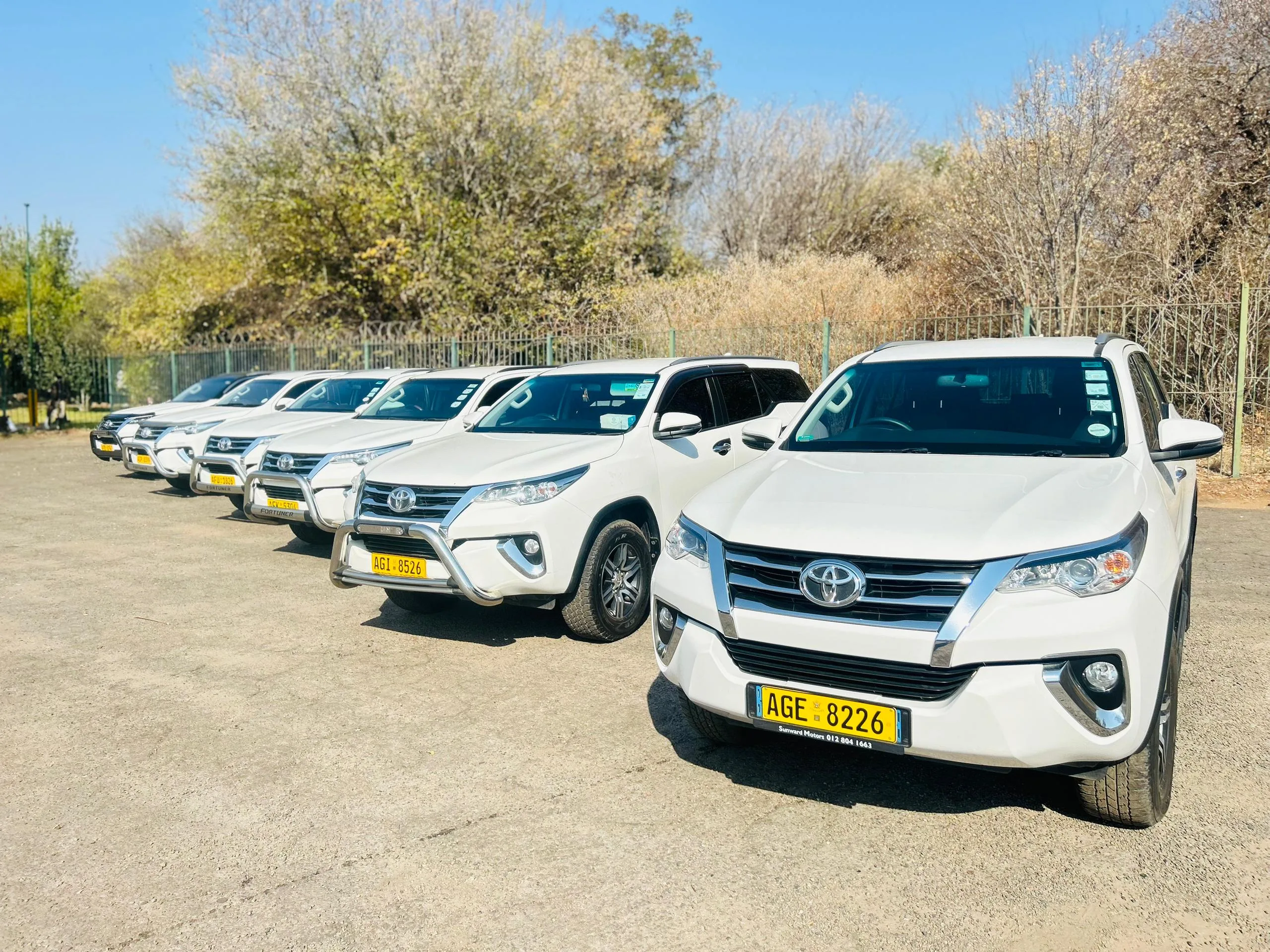 Line-up of Fortuners prepared for guest transfers in Victoria Falls